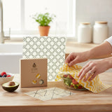 SuperBee Australia Beeginner Set beeswax wraps covering a bowl of salad on a wooden kitchen counter.