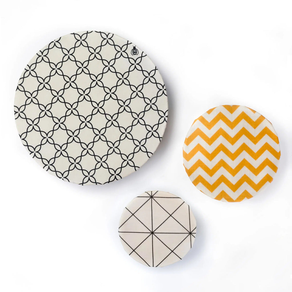 SuperBee Australia Beeginner Set of three round beeswax wraps in black and white geometric and yellow chevron patterns