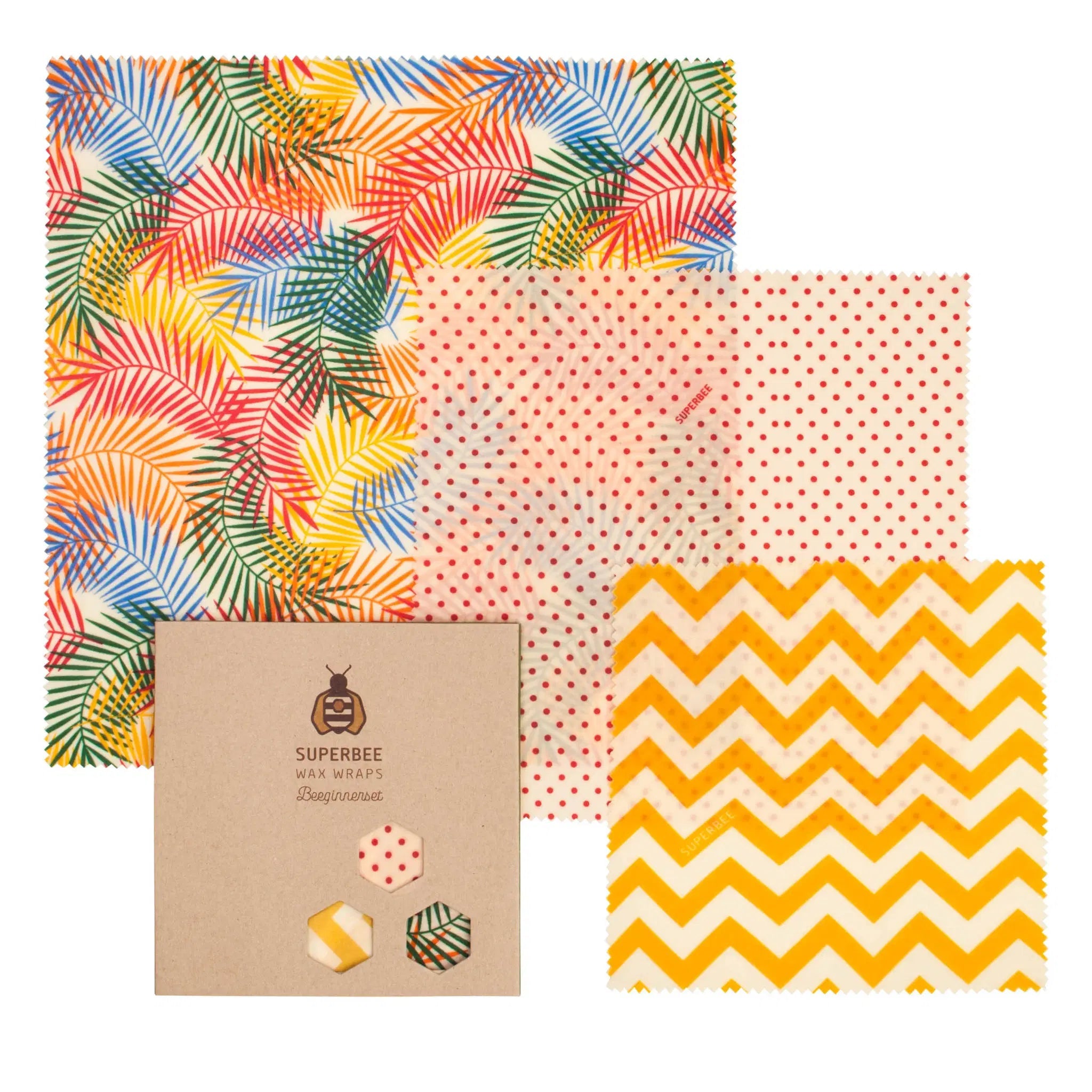 SuperBee Australia Beeginner set of three reusable beeswax wraps with tropical palm, polka dot, and chevron patterns.