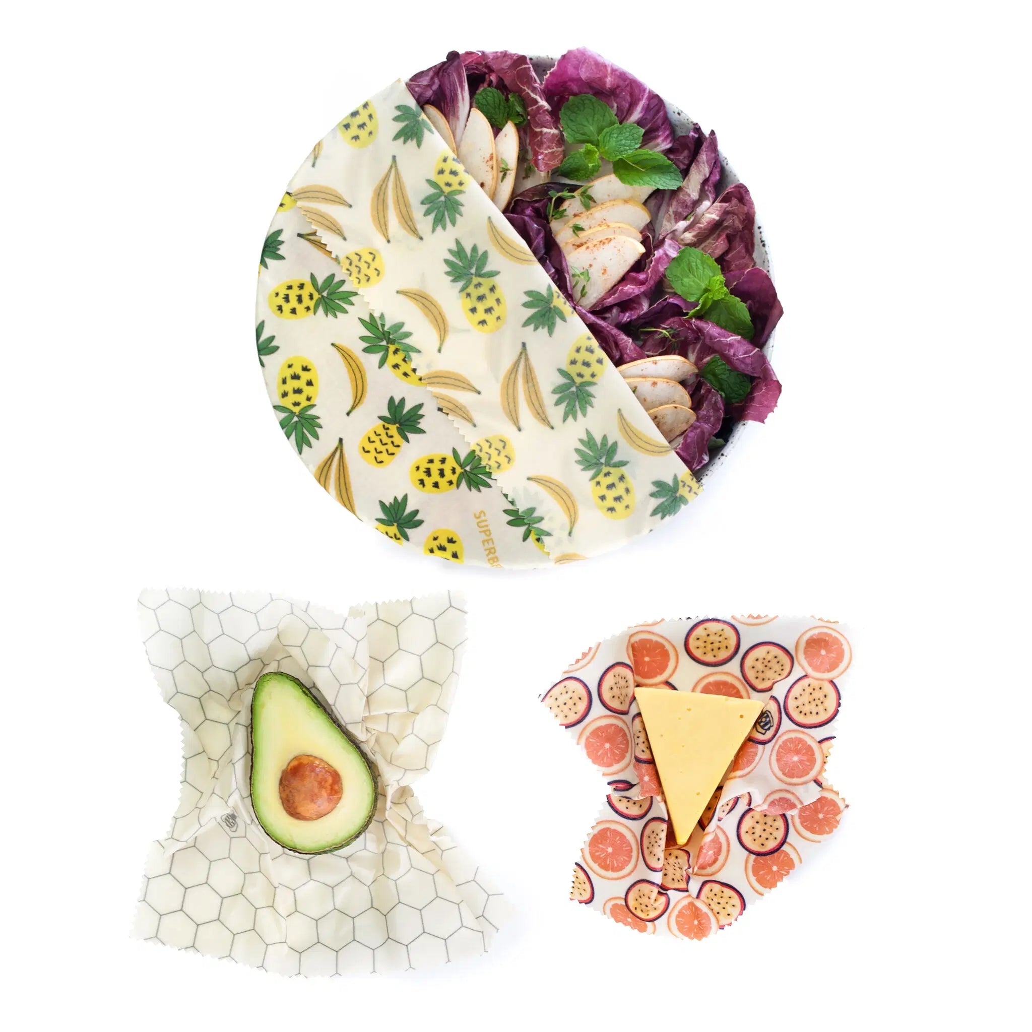 SuperBee Australia beeswax wrap set with pineapple, honeycomb, and citrus prints covering food items