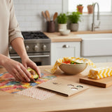 SuperBee Australia beeswax wraps in Tropical Paradise print covering an avocado and bowl in a bright kitchen setting.