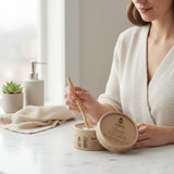 SuperBee Australia Dentos toothpaste tablets in a round cardboard container with a bamboo toothbrush