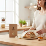 SuperBee Australia extra large beeswax wrap with a white hexagon pattern covering a loaf of bread on a kitchen counter