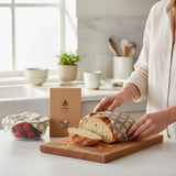 SuperBee Australia extra large beeswax wrap in Meadow print covering a loaf of bread and a bowl of berries
