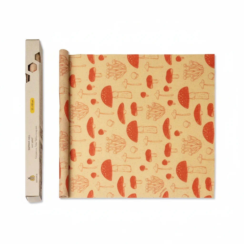 SuperBee Australia reusable beeswax wrap roll with a red mushroom pattern on a beige background next to its box