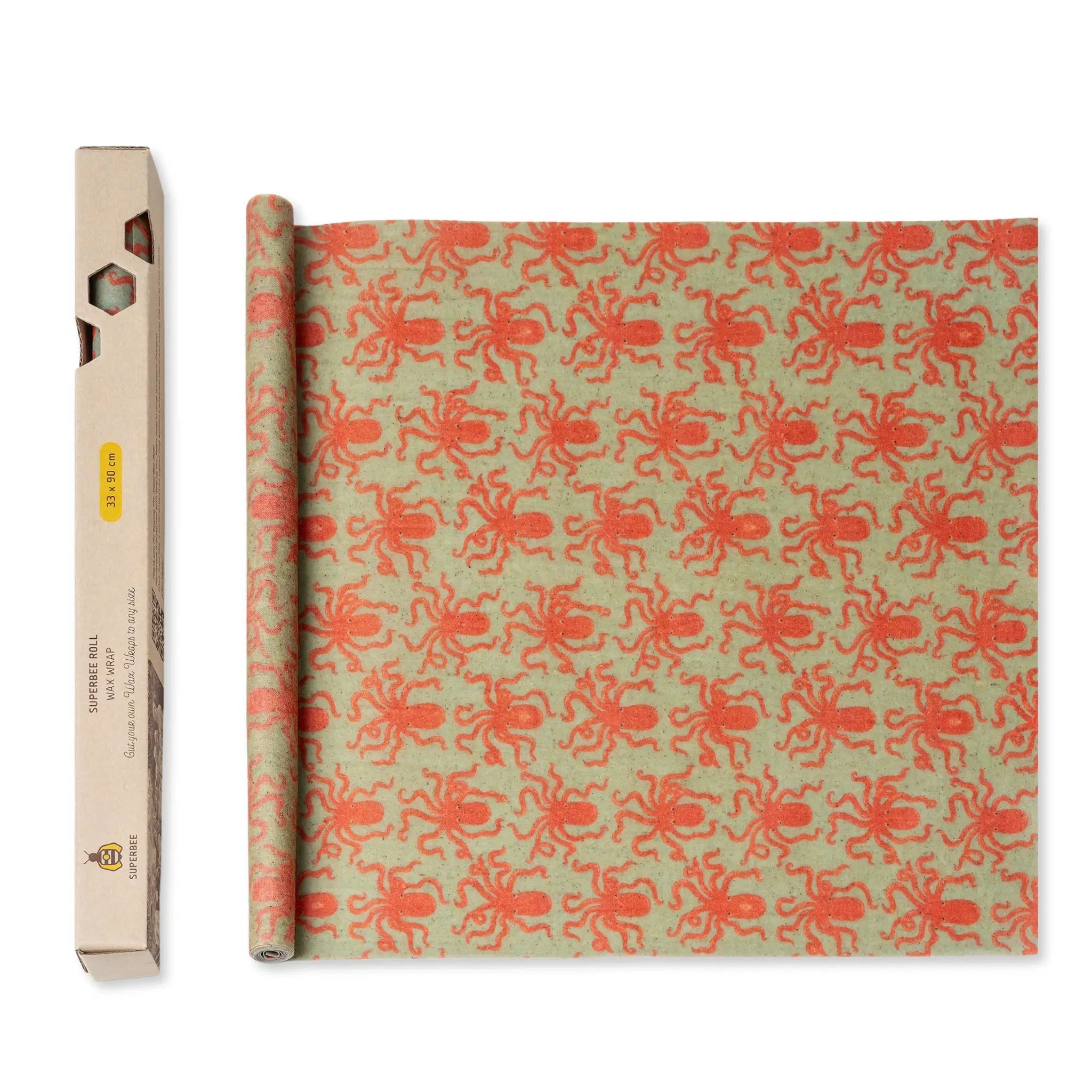 SuperBee Australia beeswax wrap roll with a green background and orange octopus pattern, shown with its packaging.