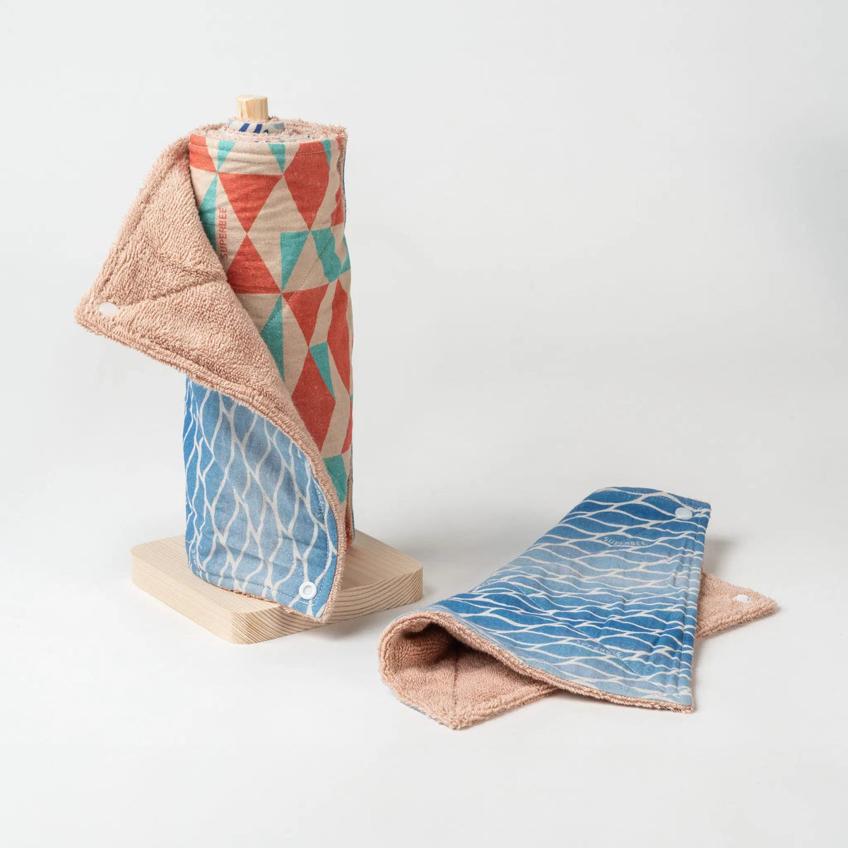SuperBee Australia reusable organic cotton kitchen towel roll in Blue Lagoon geometric and wave patterns