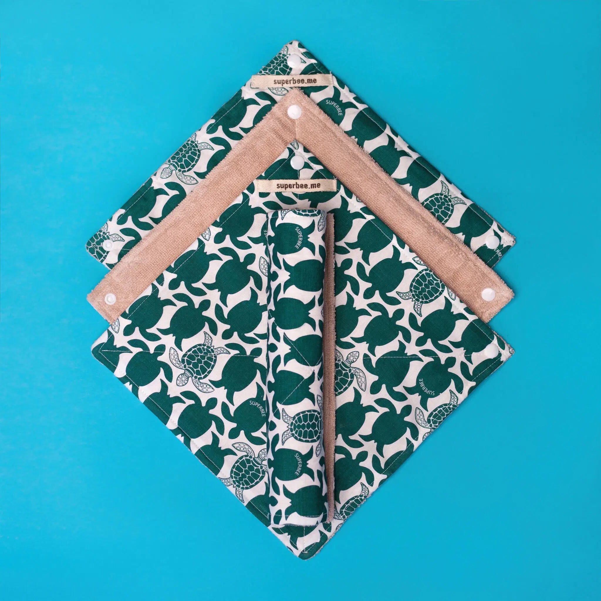 SuperBee Australia reusable organic cotton kitchen towels with green turtle print and absorbent beige towelling